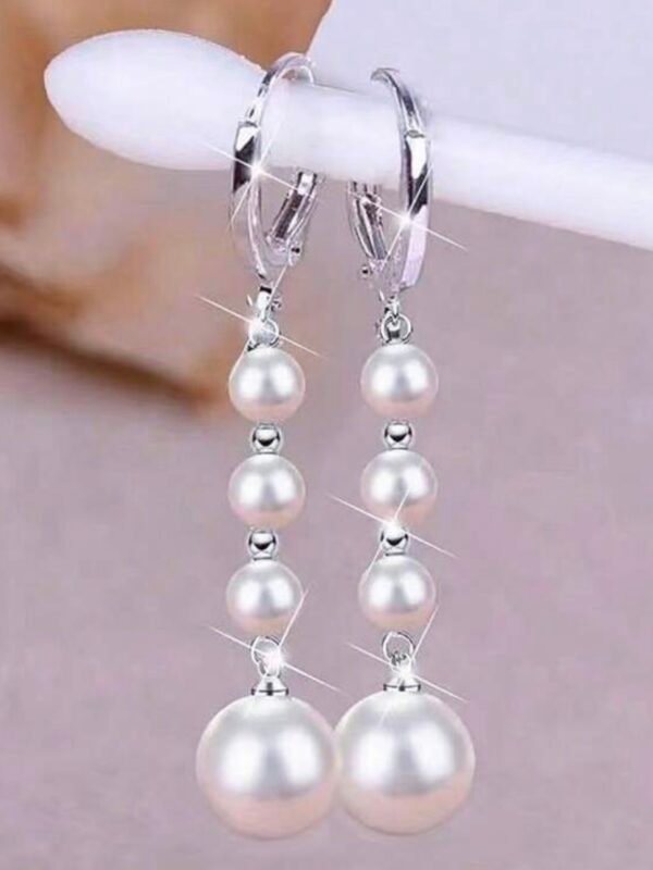 2Pcs White Pearl Dangle Earrings (4.92) - Image 2