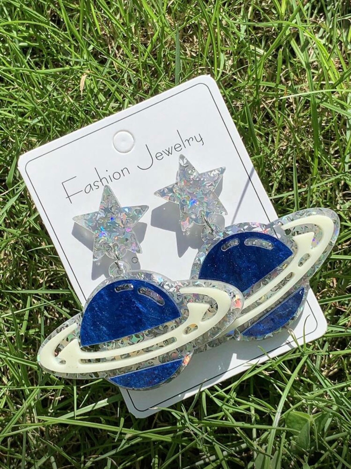 Pair Of Acrylic Planet Earrings (4.93)